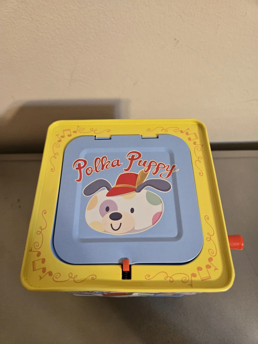 Schylling Polka Puppy Jack-in-the-Box Musical Toy